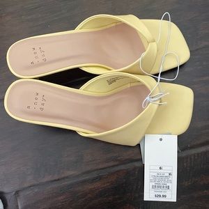 Light pastel yellow heels